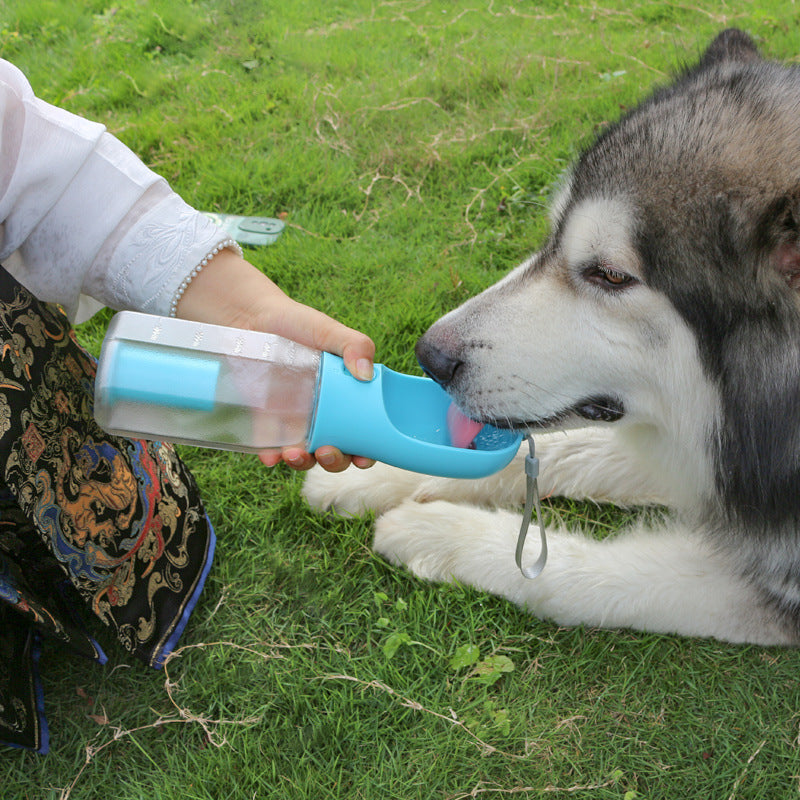 The new three-in-one pet dog accompanying cup portable drinking water dog food garbage bag one multifunctional water cup kettle